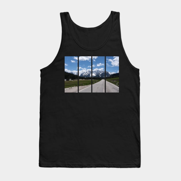 A shot on the move from the windshield of an electric car with italian snow-covered alps mountains in front of it. Sunny spring day. POV first person view shot on a mountain road. No people. Tank Top by fabbroni-art